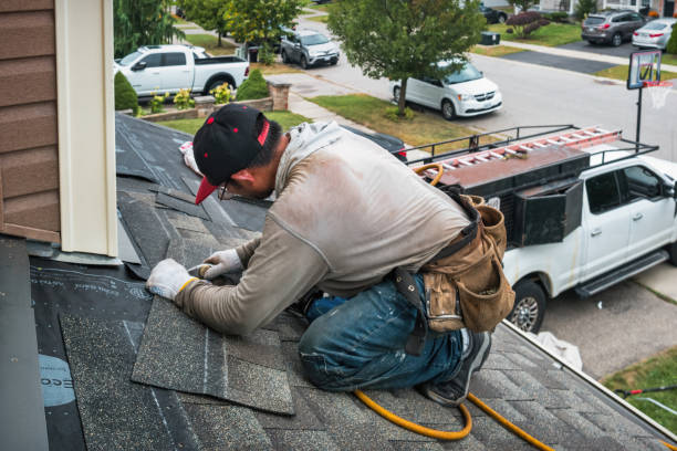 Professional Emergency Roof Repair technician working in Blue Point, NY